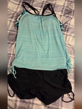 Light Aqua Tankini Top with Black Swim Shorts
